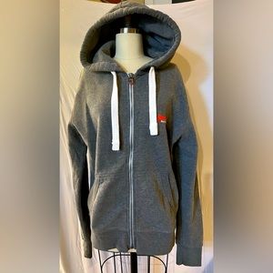 Superdry. Men’s Medium, but fits Men Small. Gray zip hood.